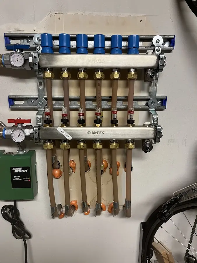 Plumber performing Gas Line Installation at a residential property in White Oak